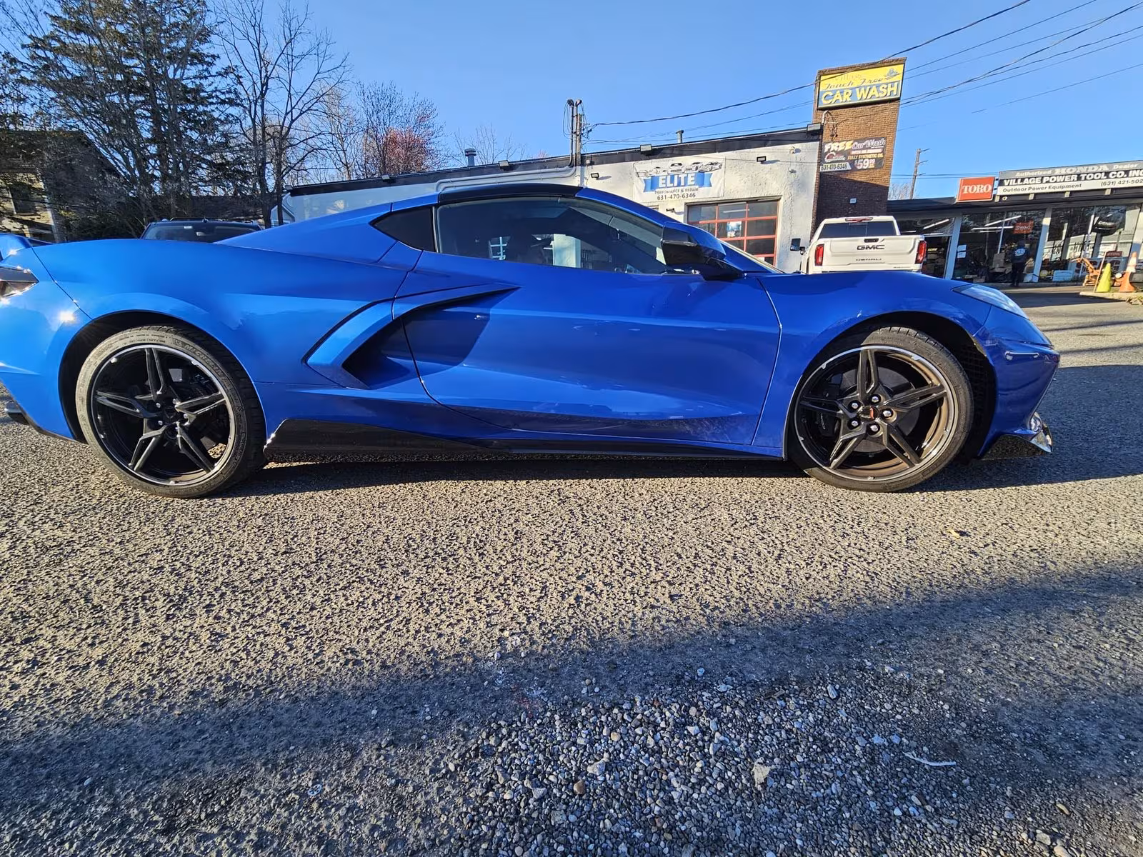 Corvette outside Elite Performance & Repair shopfront in Huntington, NY